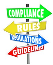 Directional sign showing "Compliance," "Rules," "Regulations," and "Guidelines".