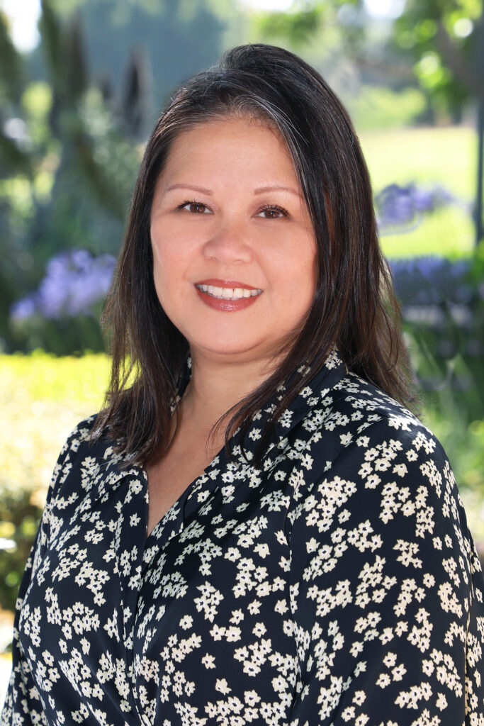 Portrait of a woman with medium length hair, outdoors