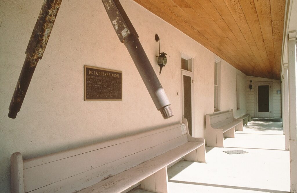 Strathearn home’s porch with built-in benches and De La Guerra Adobe plaque, 1978.